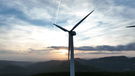 Aerial-drone-view-of-wind-turbine-spinning-at