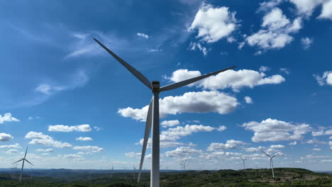 up-of-wind-turbine-blades-rotating-with-blue
