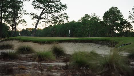 sand-bunker-in-front-of-a-golf-green