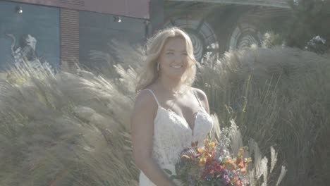 Slow-motion-shot-of-a-stunning-bride-holding-a