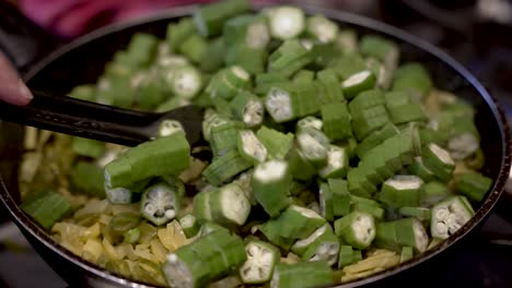 Fresh-Sliced-Okra-Being-Added-Into-Saucepan-And