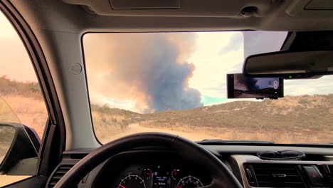 Emergency-vehicle-rushing-towards-wildfires-of-California-POV