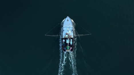 Top-down-aerial-of-fishing-boat-in-America