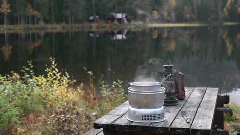 Cooking-food-infront-of-a-small-lake-with