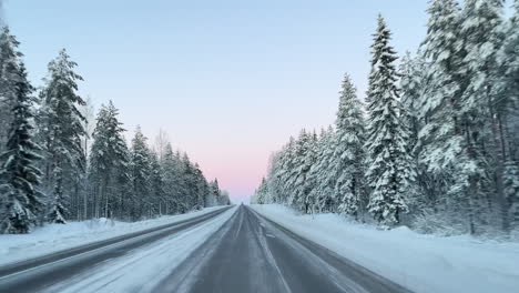 Driving-a-winter-road-with-no-cars-between