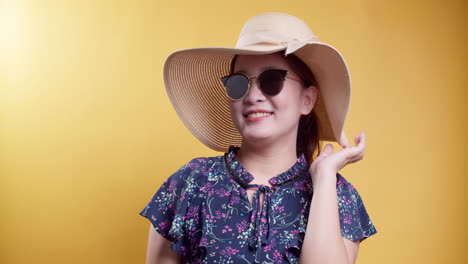 Excited-Asian-beauty-woman-with-sunglass-and-good