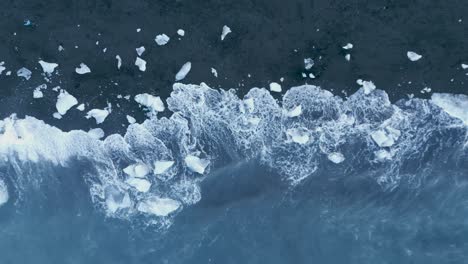 Overhead-View-Of-Icebergs-With-Splashing-Waves-On