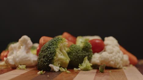 Vegetables-are-spinning-on-a-cutting-board-with