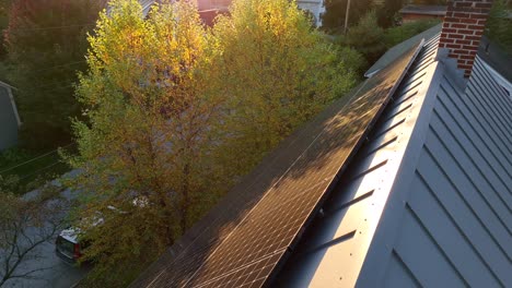 Metal-roof-with-solar-panel-array-Sunlight-reflection