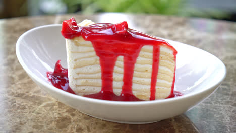vanilla-crepe-cake-with-raspberry-and-strawberry-sauce