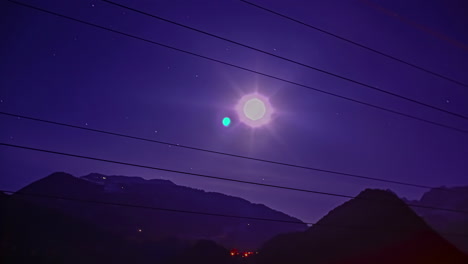 Shot-of-moon-illuminates-over-the-valley-along