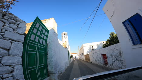 narrow-road-in-a-small-village-with-white