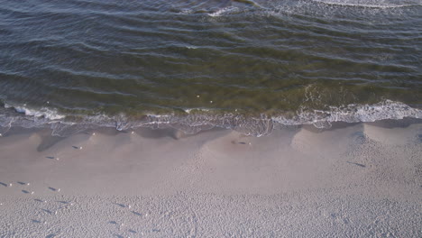 Baltic-Sea-waves-roll-over-a-sandy-beach