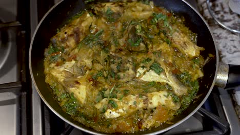 Overhead-View-Of-Fish-Curry-Being-Fried-In