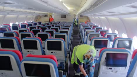 workers-cleaning-inside-the-plane-Airplane-Airport