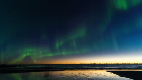 Flickering-green-Aurora-Borealis-Northern-Lights-at-Skagsanden