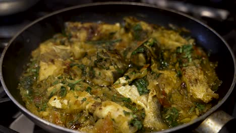 View-Of-Fish-Curry-Being-Fried-In-Saucepan