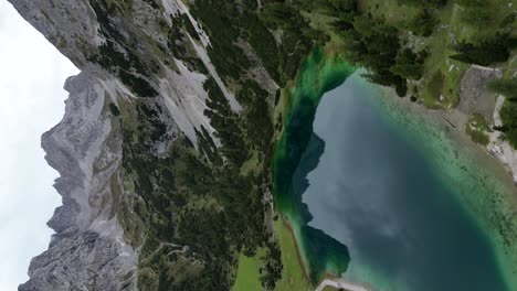 Vertical-drone-shot-mountains-and-lakes-in-Austrian