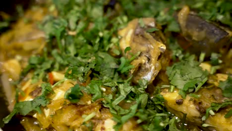 Close-Up-View-Of-Chopped-Cilantro-On-Fish