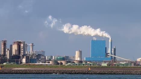 Emissions-from-industrial-chimney-near-port-with-factories