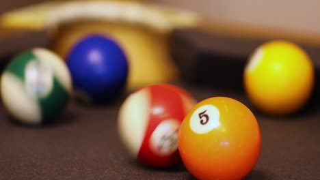 Selective-Focus-Of-Multicolored-Billiard-Balls-Roll-On