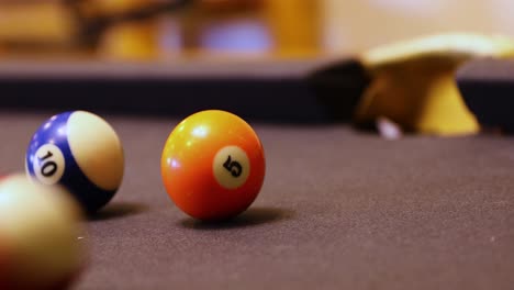 Hitting-Balls-Into-Pockets-On-Billiard-Table---close