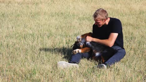 Man-Playing-with-Australian-Shepherd-Puppy-Canon-R