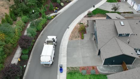 Aerial-view-following-a-yard-waste-facility-truck