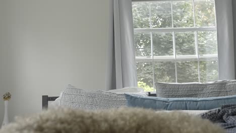 Beautiful-bedroom-tilting-down-to-reveal-sleeping-Goldendoodle