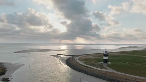 Aerial-Drone-Shot-of-lighthouse-next-to-North