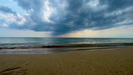 Cloudy-sky-and-clouds-over-calm-sea-and