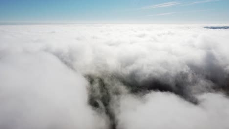 Mist-fog-clouds-from-above-aerial-view-over