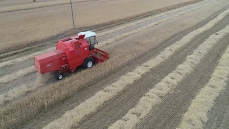 close-up-aerial-of-Harvester-red-tractor-machine