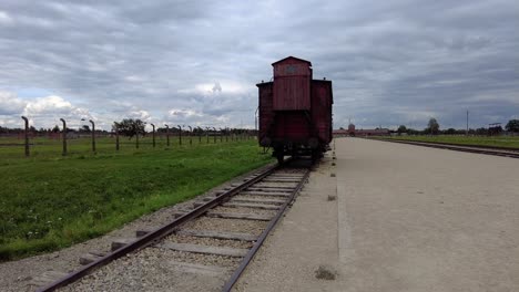 Old-Carriage-On-Rails-In-Auschwitz-Birkenau-Concentration-Camp
