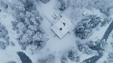 Aerial-drone-bird's-eye-view-over-a-cottage