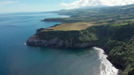 Flying-Backwards-with-Drone-above-Stunning-Coastline-of