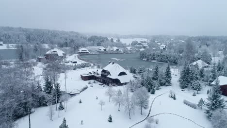 Aerial-View-of-Winter-in-Baltic-Countryside-Village