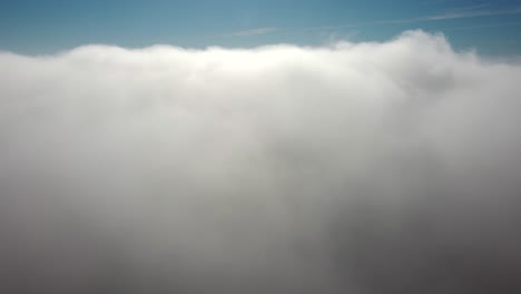 Mist-fog-from-above-aerial-view-ascending-flying