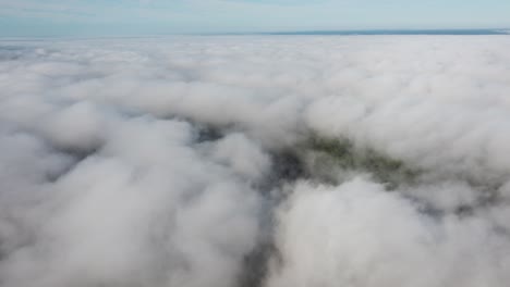 Mist-fog-clouds-from-above-aerial-view-over