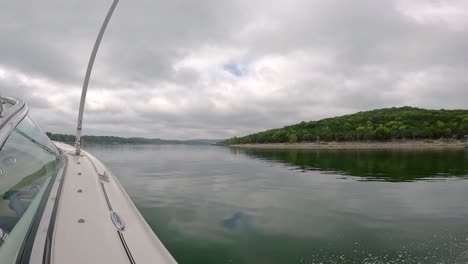 POV-out-the-side-of-sports-boat-cruising
