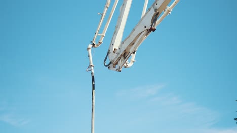 Concrete-Pumping-Truck-Hose-in-the-Air