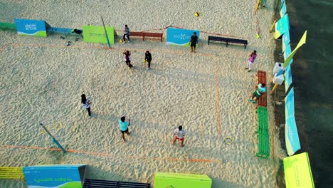 People-playing-volley-ball-on-beach
