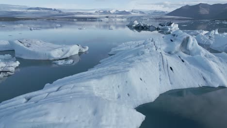 Panorama-Of-Jokulsarlon-Glacial-Lagoon-Icebergs-And-Calm-Waters-In-Iceland
