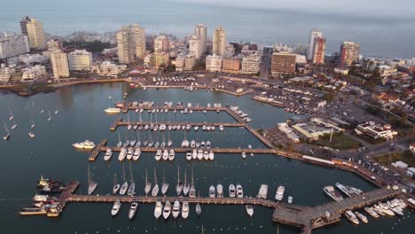 Birds-eye-view-of-yachts-moored-at-cruise-port-at-seaside-city-of-Punta-del-Este