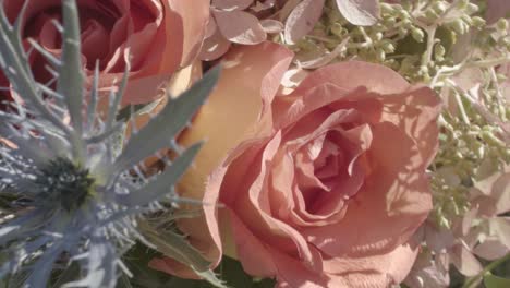 Close-up,-panning-shot-of-a-beautiful-bouquet-of-roses-and-colorful-flowers