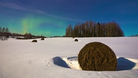 Time-Lapse-of-Aurora-Borealis,-Polar-Lights-and-Stars-Above-Rural-White-Winter-Landscape