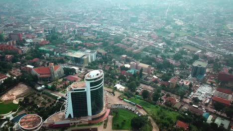 Aerial-View-Over-Pearl-Of-Africa-Hotel-In-The-City-Of-Kampala-In-Uganda---drone-shot