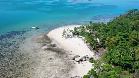 aerial-of-white-sand-beach-with-large-boulder-rocks-in-belitung-indonesia