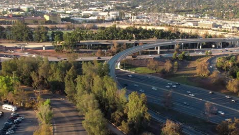 The-Glendale-2-and-Ventura-134-freeway-interchange-in-the-Eagle-Rock-neighborhood-of-Los-Angeles,-California---ascending-aerial-view