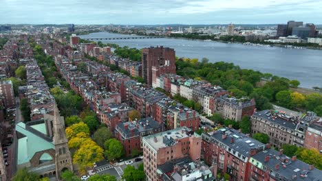 High-rotating-orbiting-shot-of-housing-in-Boston-along-Charles-River